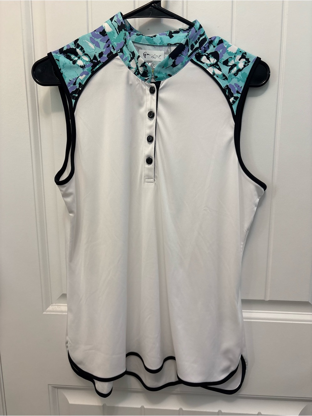 Greg Norman Sleeveless White Golf Polo with butterfly pattern. Size Large.